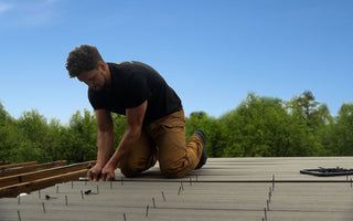 Contractor installing a Deckorators deck