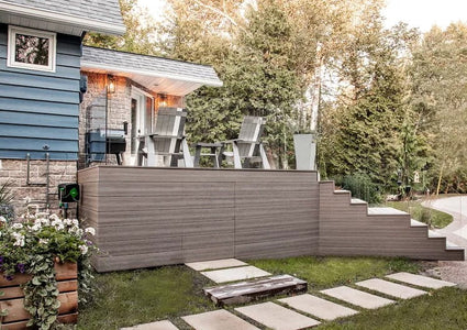 Blue House with Composite Deck and Glass Railing