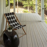 Side Porch with Deckorators Voyage Decking in Tundra and Contemporary Cable Rail #color_tundra