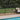 Pool Enclosed with Deckorators 54" Aluminum Fencing #color_textured-black