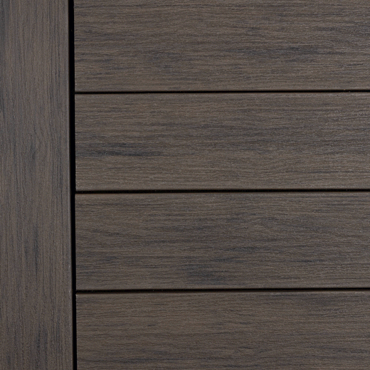 Close-up of Deckorators Vista Deck Boards Installed in Ironwood