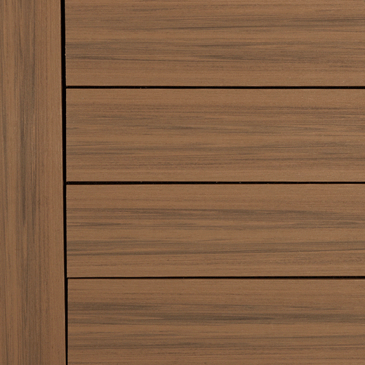 Angled close-up of Deckorators Voyage Solid Deck Board in Sedona