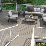Deck off of Back of House Built Using Deckorators Venture Decking and Rapid Railing #color_textured-white