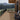 Log cabin with deck off back made of Deckorators Altitude Decking in Highland and Rapid Rail #color_highland