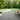Large deck with backyard made using Deckorators Elevate Decking in Ridge Gray #color_ridge-gray