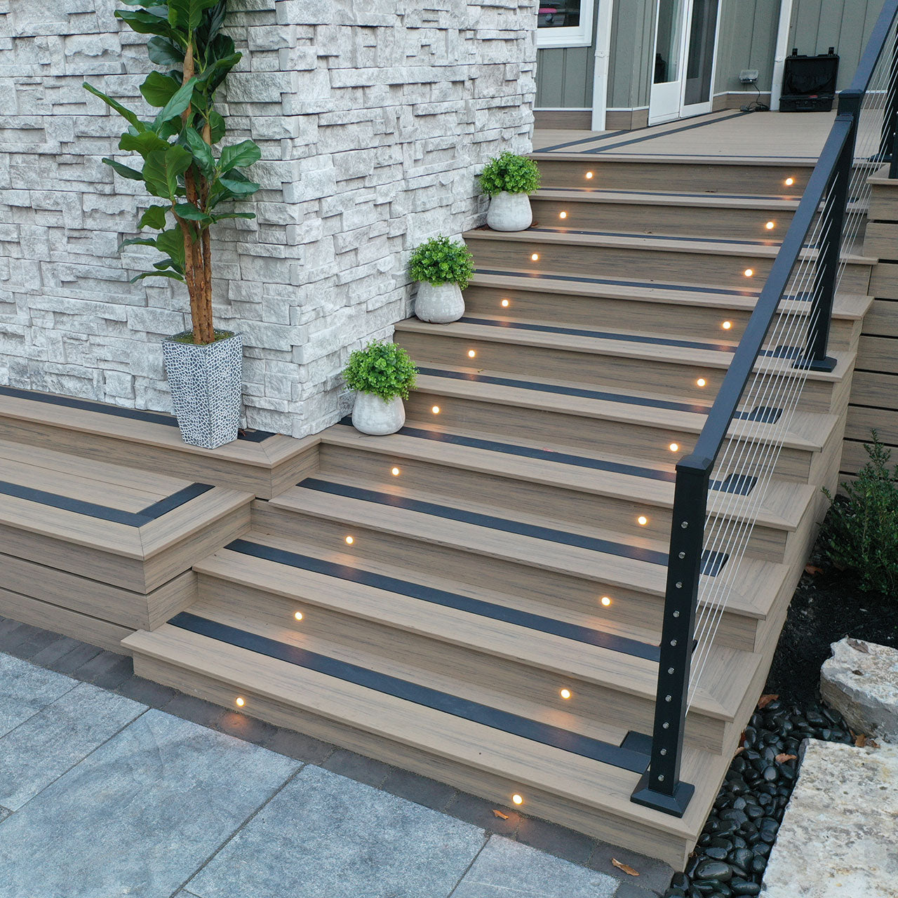 Deck steps with deck lighting and Cable Railing