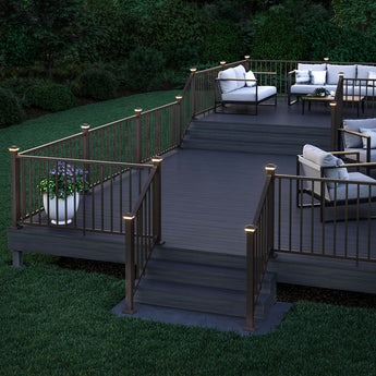 Deck with Aluminum Railing and Deckorators Classic Solar Post Caps in Weathered Brown #color_weathered-brown