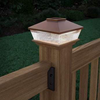 Close-up Lifestyle of Deckorators High Point Copper Solar Post Cap #color_copper