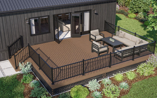 Composite deck with furniture and deck railing in a residential setting