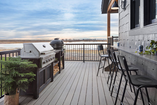 HGTV's Rock the Block House's Outdoor Grill Area Featuring Deckorators Vista Decking in Driftwood