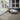 Blue House with Deckorators Porch Flooring in Glacier #color_glacier