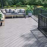 Large Deck Built Out of Deckorators Voyage Decking in Dusk, Picture Frame Board in Dark Slate and Contemporary Railing in Textured Black #color_dusk