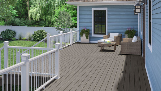 Blue House with Deck Made from Deckorators Venture Decking and White Rapid Rail