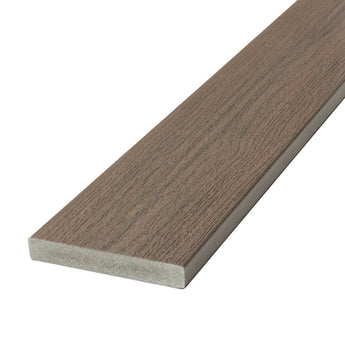 Angled Close-up Vista Solid Deck Board in Ironwood #color_ironwood