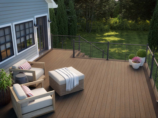 Deckorators Vista Deck in Ironwood, Contemporary Cable Rail in Bronze with Two Chairs On It