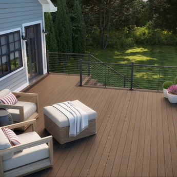 Deckorators Vista Deck in Ironwood, Contemporary Cable Rail in Bronze with Two Chairs On It #color_dunewood