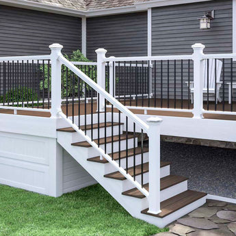 House with Deck with Stairs Featuring Deckorators Voyage Decking in Khaya and Fascia in White #color_white