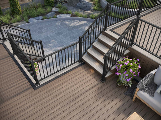Deckorators Voyage Decking in Khaya and Tundra, Picture Frame Board in Dark Slate and Conteporary Railing in Textured Black