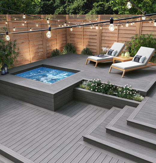 Hot Tub with Decking Surrounding it made of Deckorators Voyage Decking in Sierra