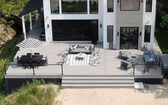 Beach House with Deckorators Voyage Decking in Tundra and Contemporary Cable Rail #color_tundra
