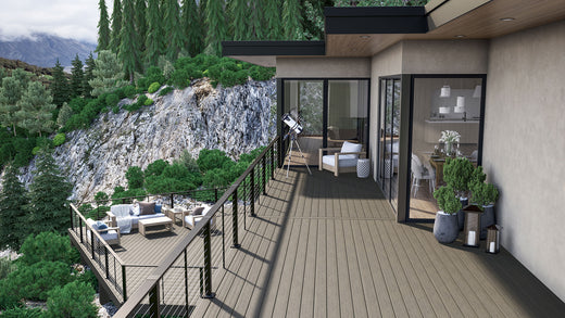 House with deck within side of mountain made of Deckorators Altitude Decking and Contemporary Cable Rail