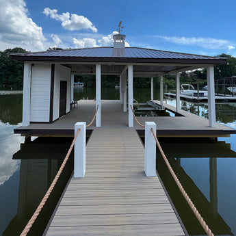 Boat House and Dock Built with Deckorators Marine Decking