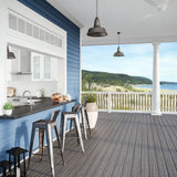 Beach house with Deckorators for Lowe's Tropics Deck in Tidal Gray #color_tidal-gray