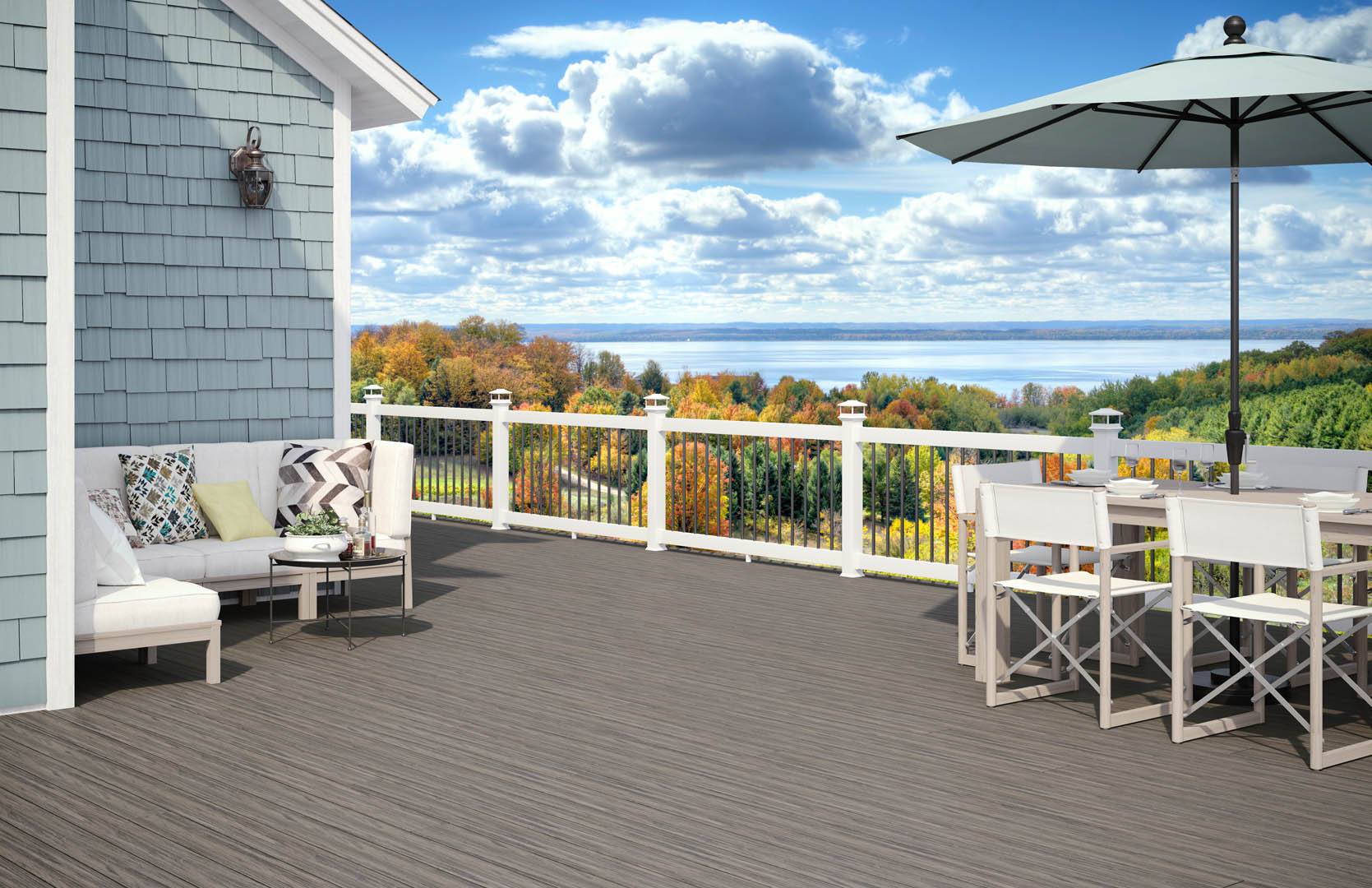 Deckorators for Lowe's Deck in Tidal Gray with Fall Landscape #color_tidal-gray